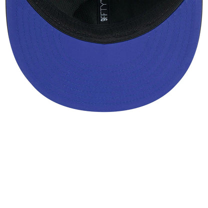 Patriots NFL Sideline 2026 Charcoal New Era 9FIFTY Snapback Adjustable Cap, inside view showing the blue undervisor and black sweatband, with the 9FIFTY logo printed on the black taping running along the inner seam.