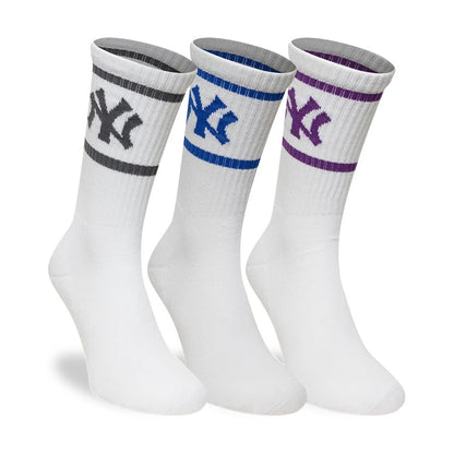 New Era New York Yankees MLB White 3 Pack Crew Socks, front view showcasing three pairs of white socks, each with a distinct embroidered New York Yankees logo in grey, blue, and purple, and matching horizontal stripes near the top.