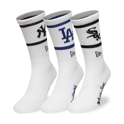 New Era MLB Multi Team White 3 Pack Crew Socks, front view showing three white socks each with a different embroidered team logo: New York Yankees with black stripe, Los Angeles Dodgers with blue stripe.