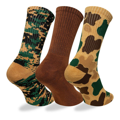 New Era Camo Brown 3 Pack Crew Socks, front view showing a set of three socks with different patterns: one in a green and black digital camo print, one in solid brown with thin vertical lines, and one in a classic brown and green camo print.