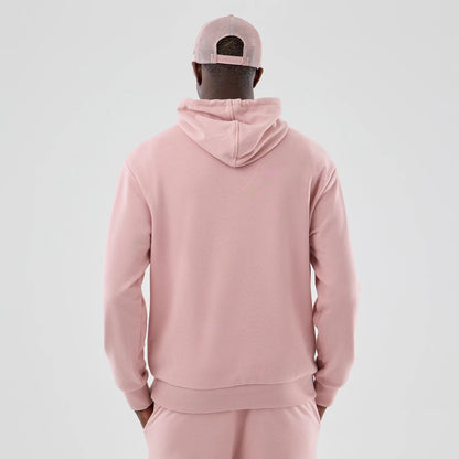 The model is wearing this MLB Midi League Essential LA Dodgers Oversized Pullover Hoodie in pastel pink. 2