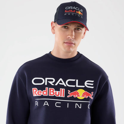 The model is wearing this Red Bull Racing Oversized Crew Neck Sweater in dark blue. 5