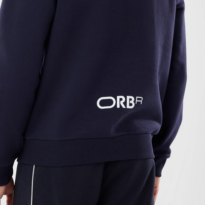 The model is wearing this Red Bull Racing Oversized Crew Neck Sweater in dark blue. 6