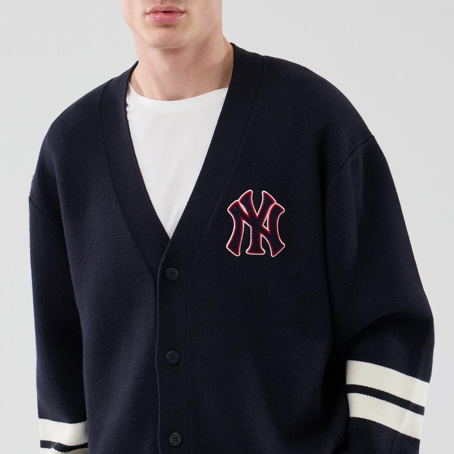 The model is wearing this MLB Knit New York Yankees Cardigan in navy. 3