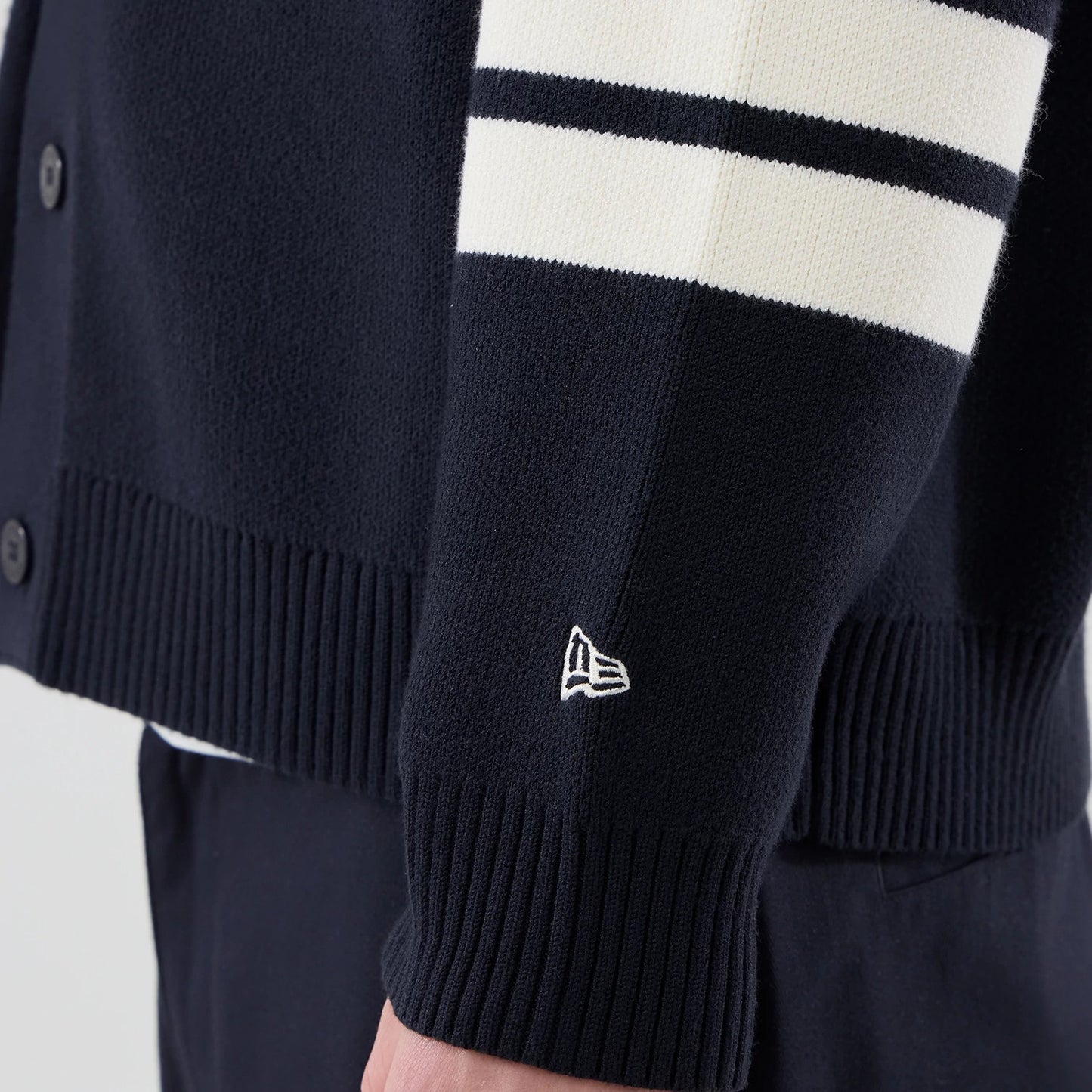 The model is wearing this MLB Knit New York Yankees Cardigan in navy. 5