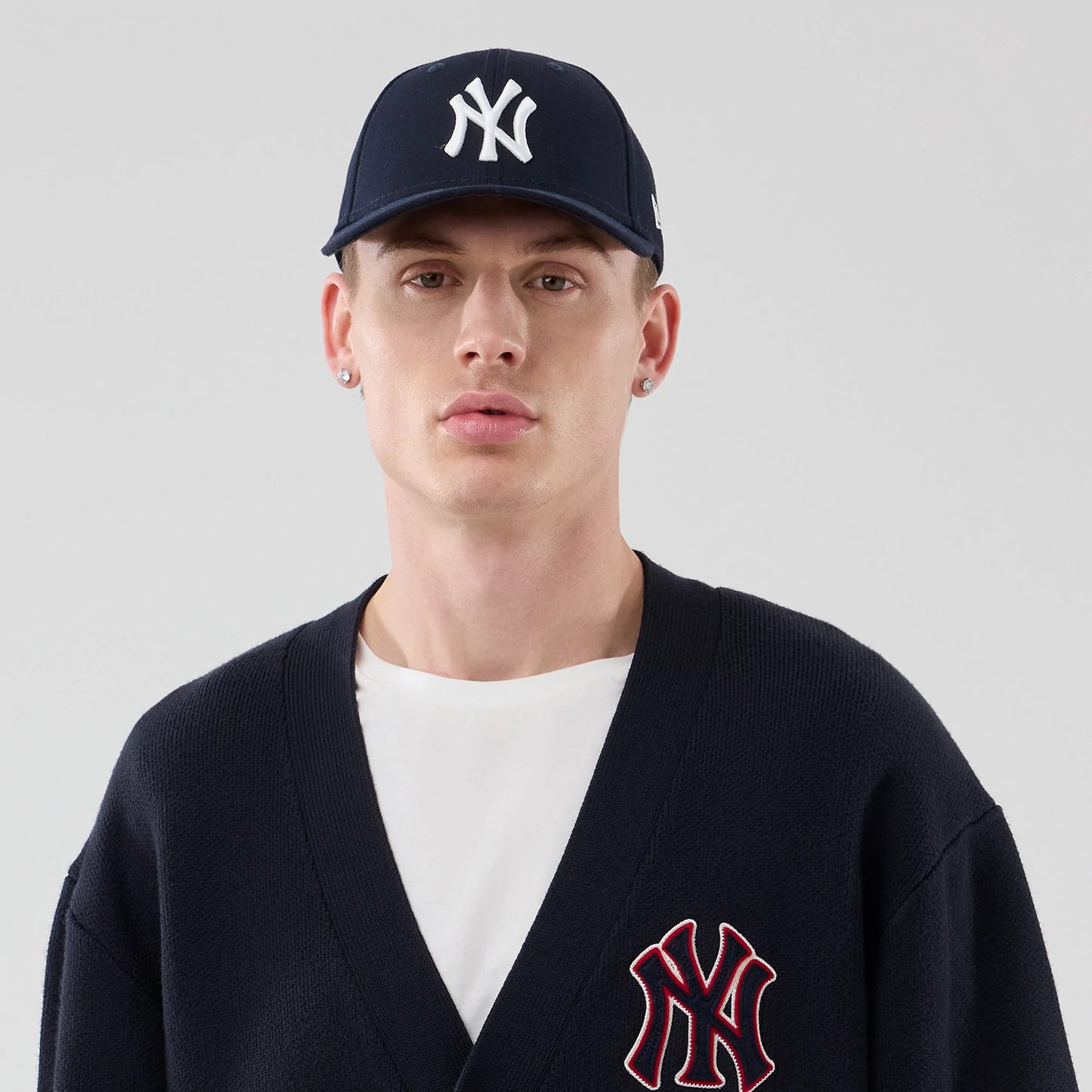 The model is wearing this MLB Knit New York Yankees Cardigan in navy. 6