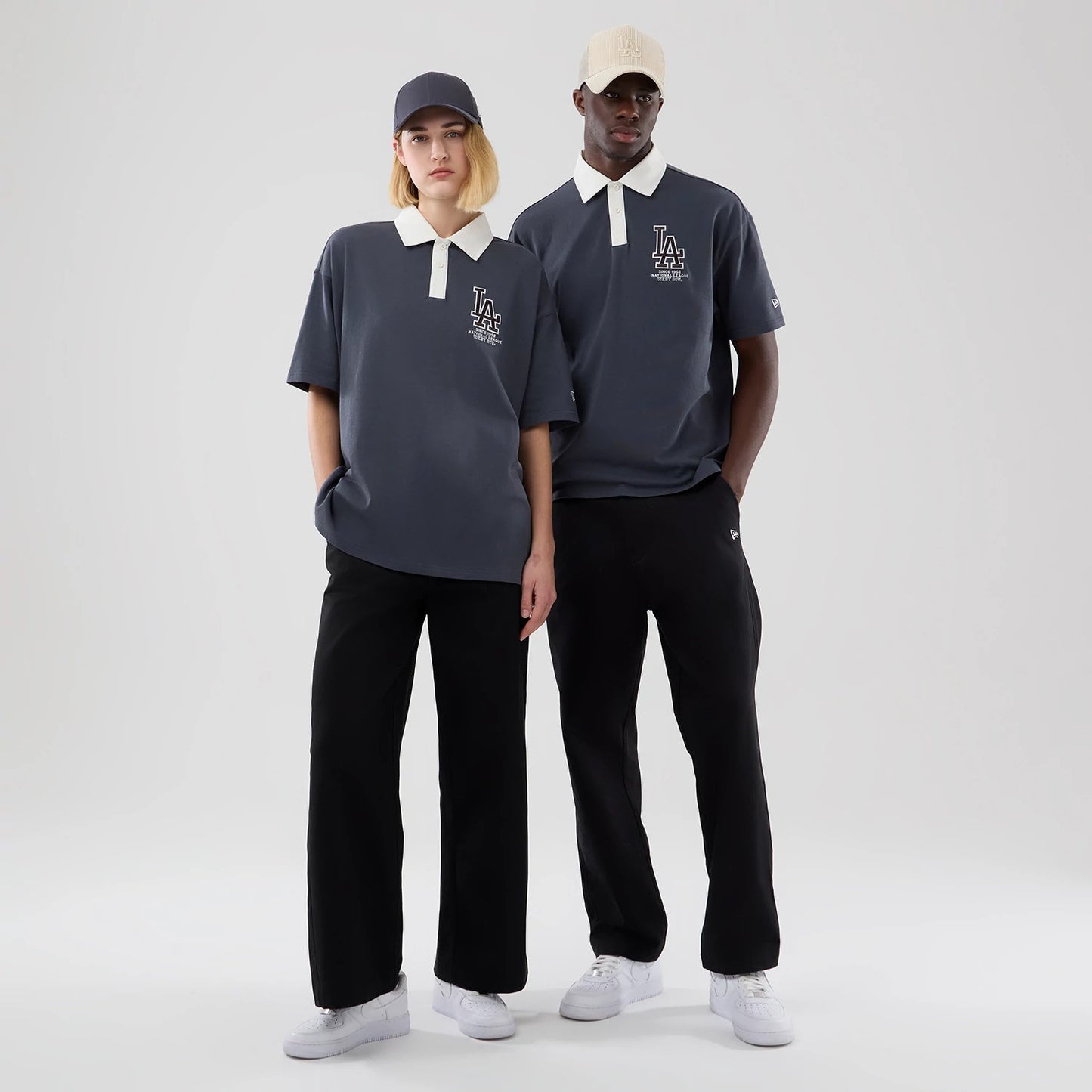 The model is wearing this MLB LA Dodgers Polo T-Shirt in grey. 1