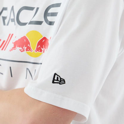 The model is wearing this Red Bull Racing Graphic Oversized T-Shirt in white. 5