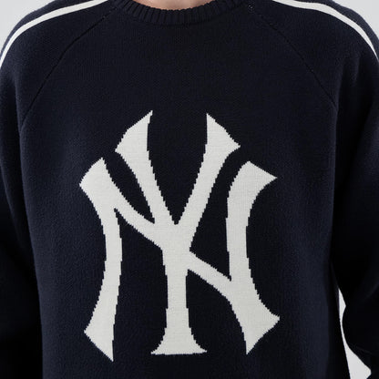 The model is wearing this MLB Knit New York Yankees Knitted Sweater in navy. 4