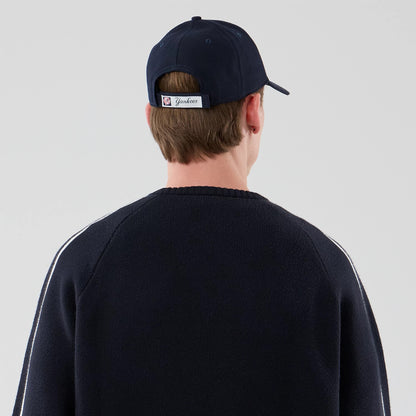 The model is wearing this MLB Knit New York Yankees Knitted Sweater in navy. 7
