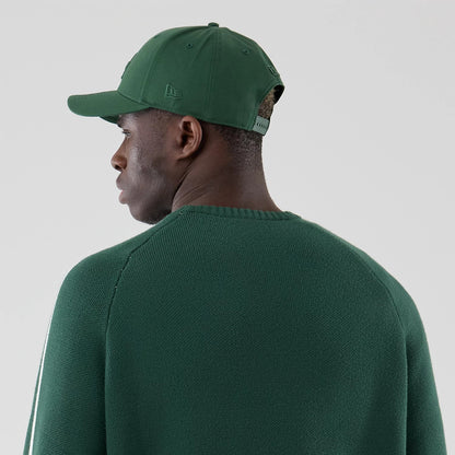 The model is wearing this MLB Knit LA Dodgers Knitted Sweater in dark green. 7