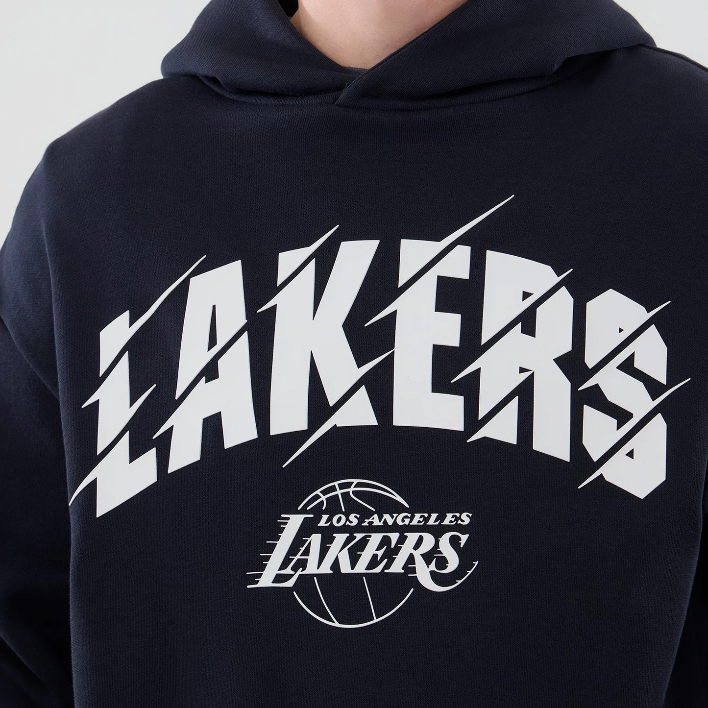 The model is wearing this NBA Core Plus LA Lakers Pullover Hoodie in navy. 4