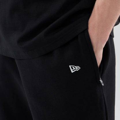 The model is wearing these New Era Tech Straight Leg Joggers in black. 5