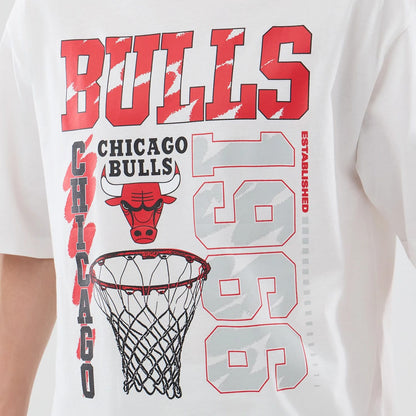 The model is wearing this NBA Basketball Graphic Chicago Bulls Oversized T-Shirt in white. 6