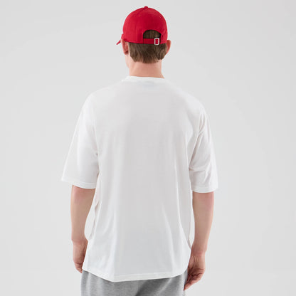 The model is wearing this NBA Script Graphic Chicago Bulls Oversized T-Shirt in white. 2