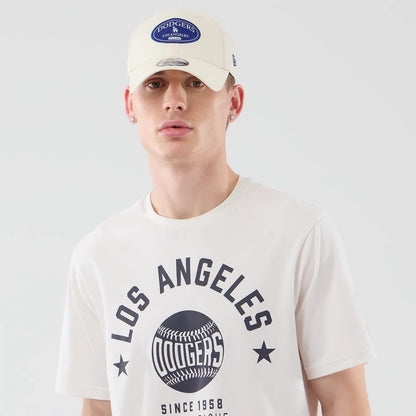 The model is wearing this MLB Graphic LA Dodgers T-Shirt in open white. 6
