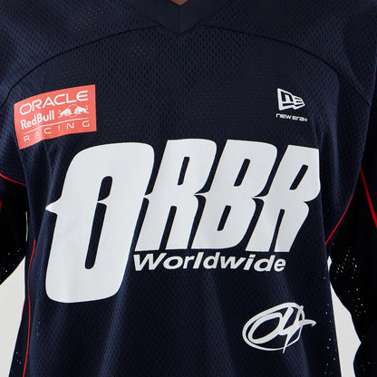 The model is wearing this Red Bull Racing Hockey Jersey in dark blue. 4