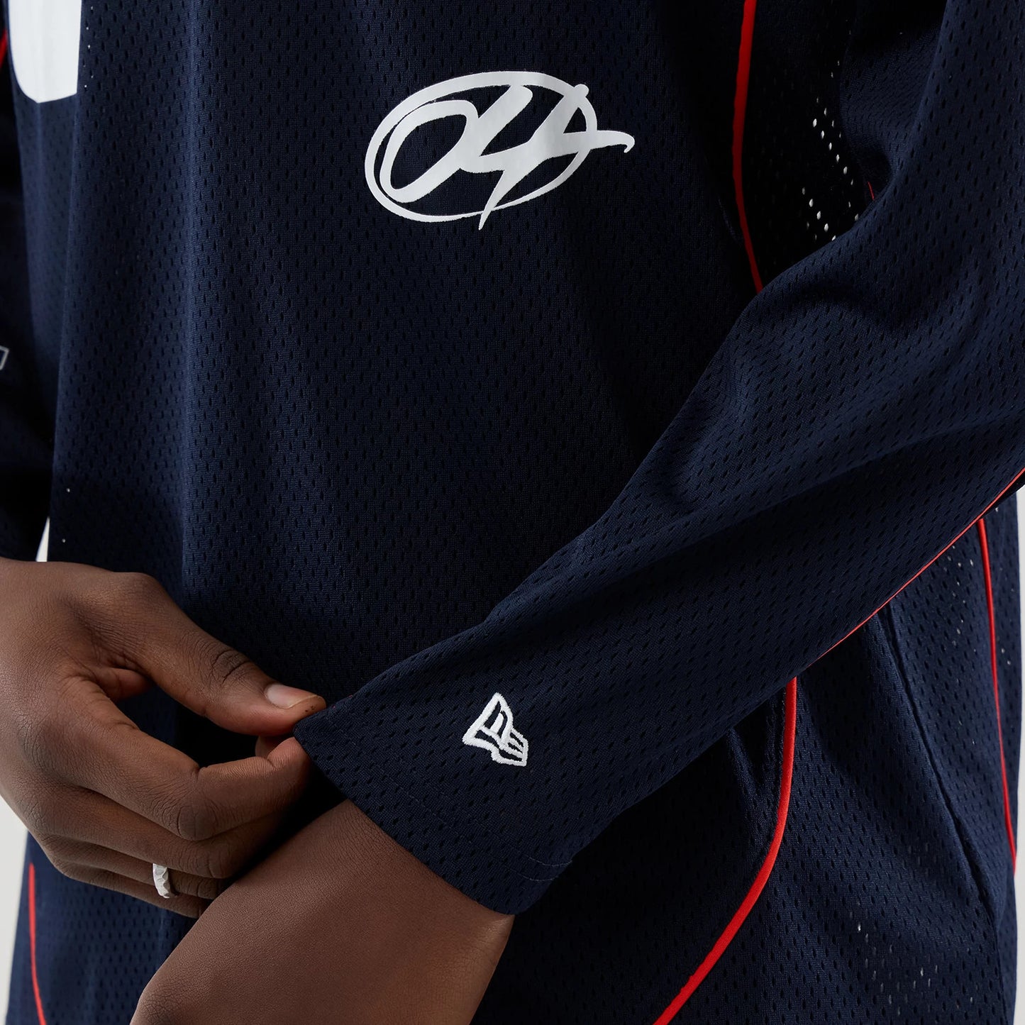 The model is wearing this Red Bull Racing Hockey Jersey in dark blue. 5