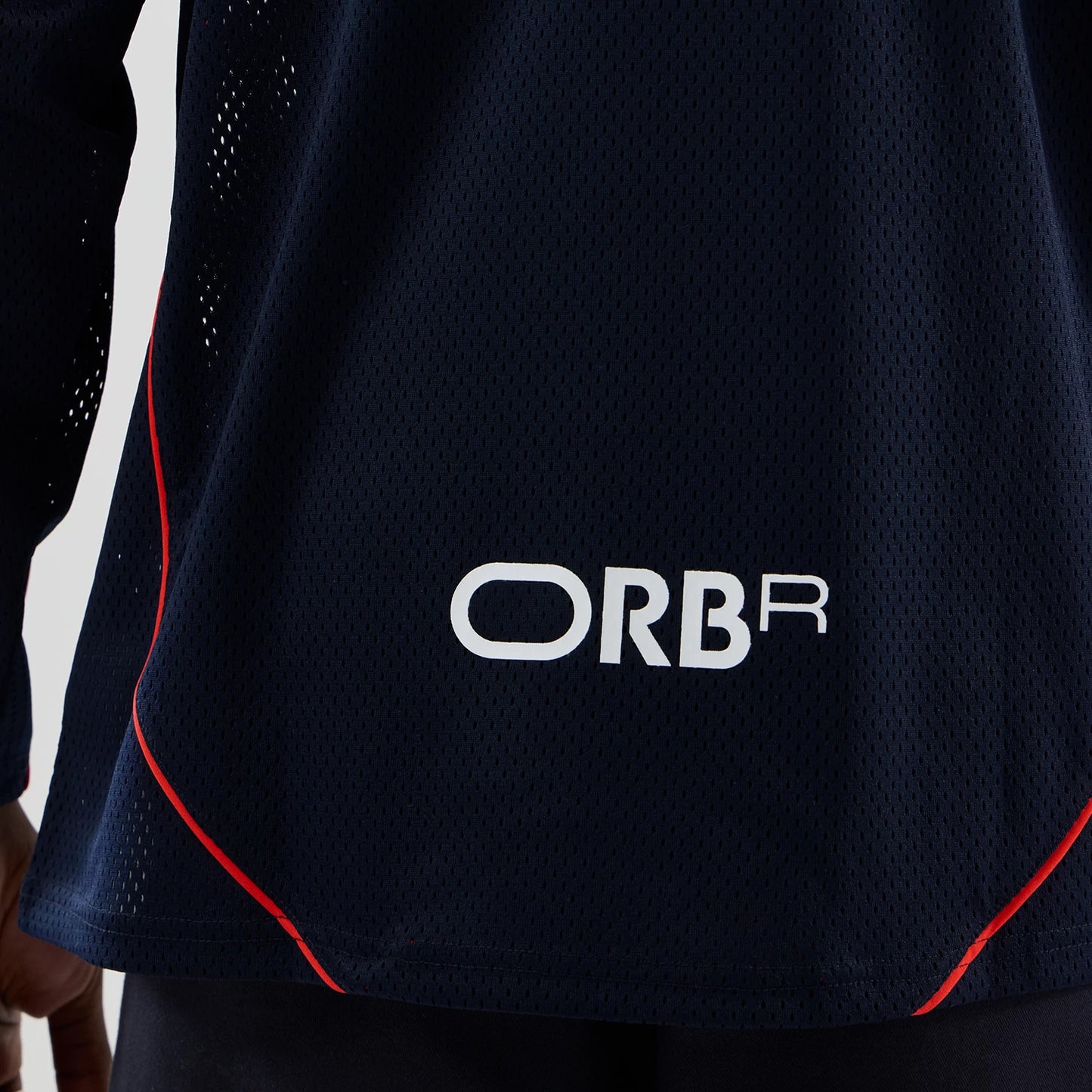 The model is wearing this Red Bull Racing Hockey Jersey in dark blue. 6