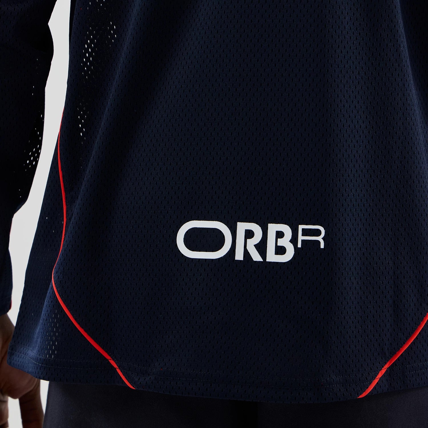 The model is wearing this Red Bull Racing Hockey Jersey in dark blue. 6