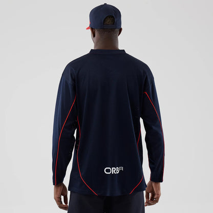 The model is wearing this Red Bull Racing Hockey Jersey in dark blue. 2