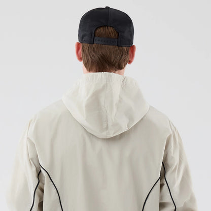 The model is wearing this MLB Piping New York Yankees Jacket in cream. 7