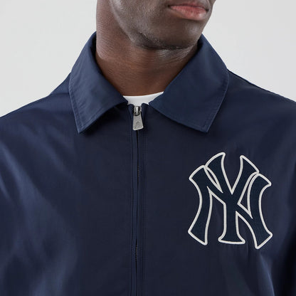 The model is wearing this MLB Collared New York Yankees Jacket in navy. 4