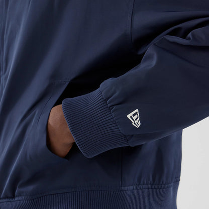 The model is wearing this MLB Collared New York Yankees Jacket in navy. 5