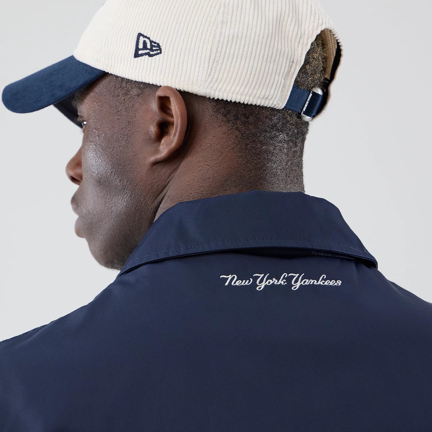 The model is wearing this MLB Collared New York Yankees Jacket in navy. 7