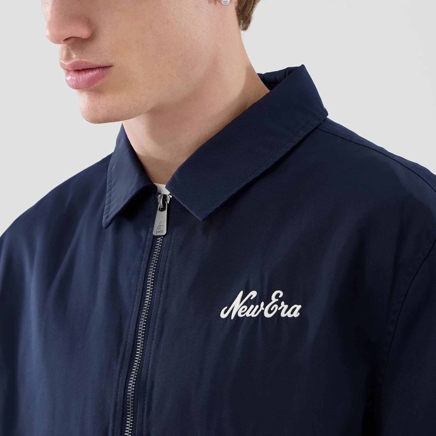 The model is wearing this New Era Shacket in navy. 6