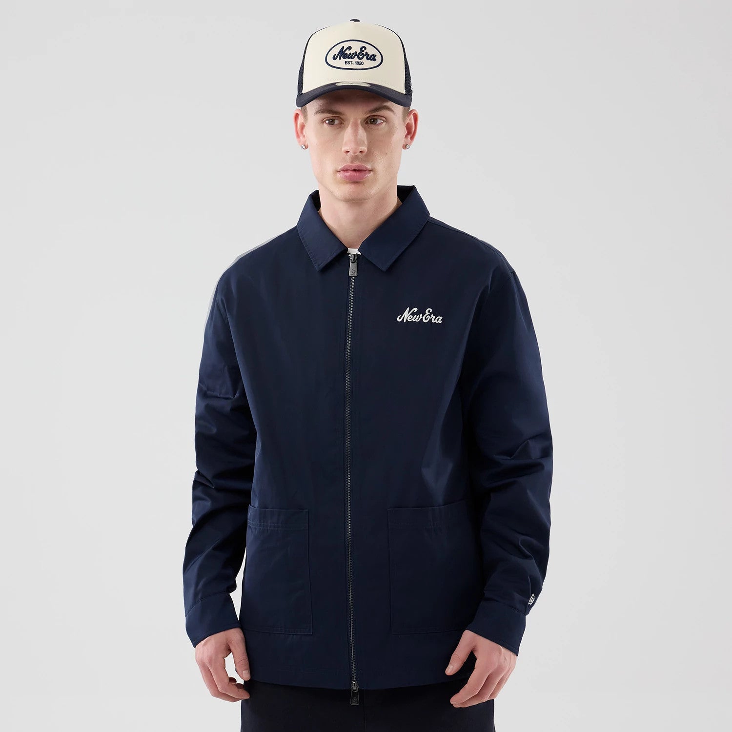 The model is wearing this New Era Shacket in navy. 1