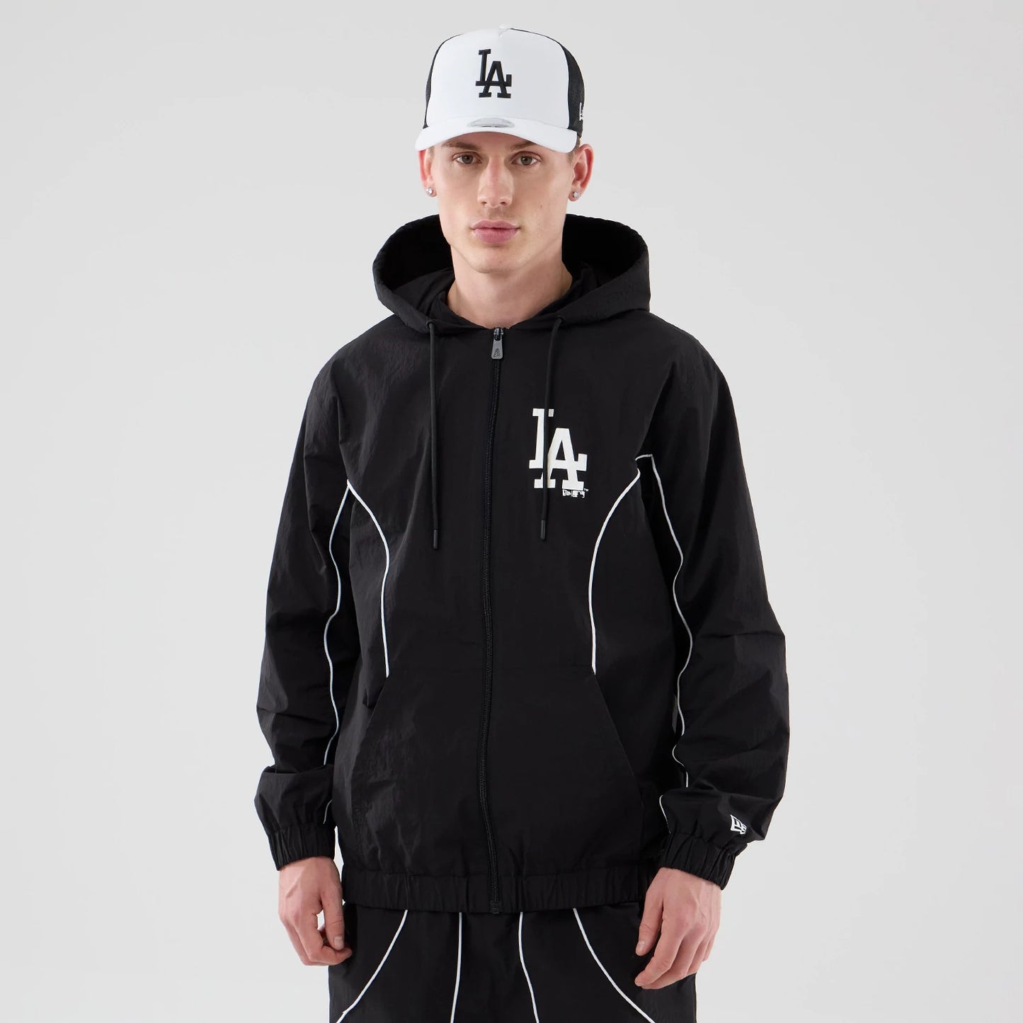 The model is wearing this MLB Piping LA Dodgers Jacket in black. 1