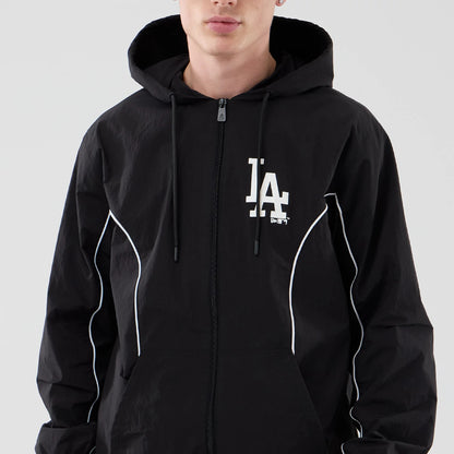 The model is wearing this MLB Piping LA Dodgers Jacket in black. 3