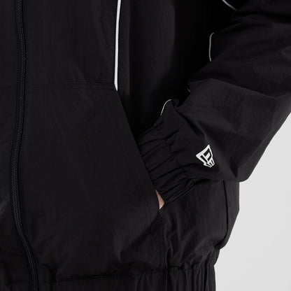 The model is wearing this MLB Piping LA Dodgers Jacket in black. 5