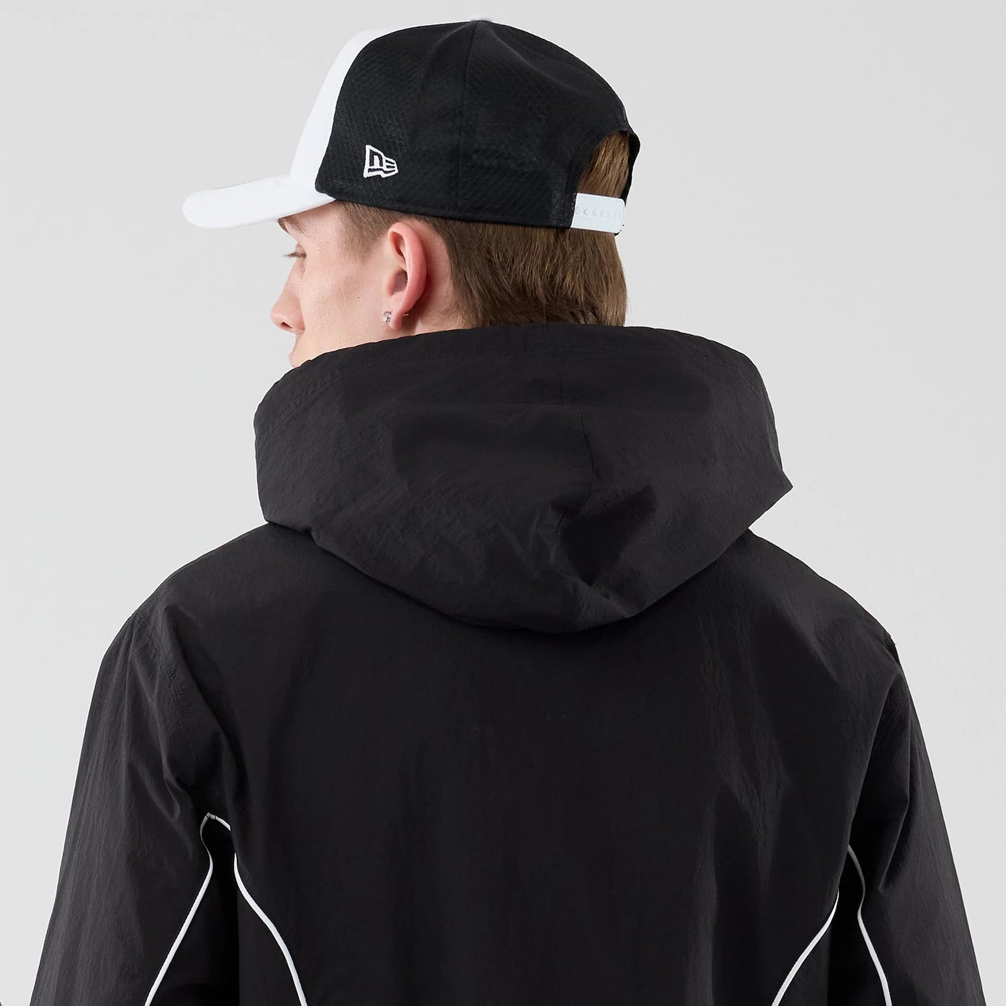 The model is wearing this MLB Piping LA Dodgers Jacket in black. 7