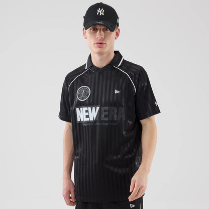 The model is wearing this New Era Football Jersey T-Shirt in black. 1