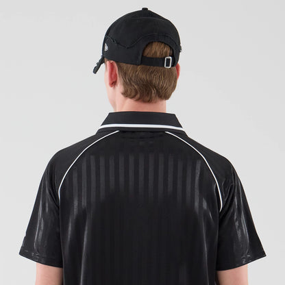 The model is wearing this New Era Football Jersey T-Shirt in black. 7