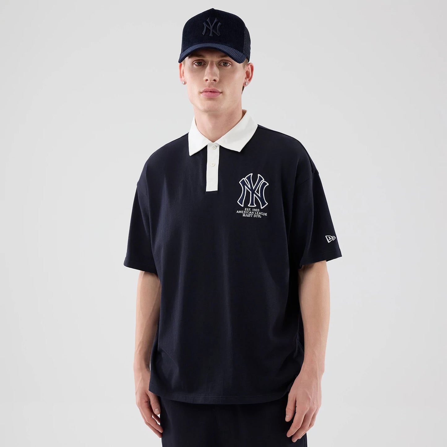 The model is wearing this MLB New York Yankees Polo T-Shirt in navy. 3