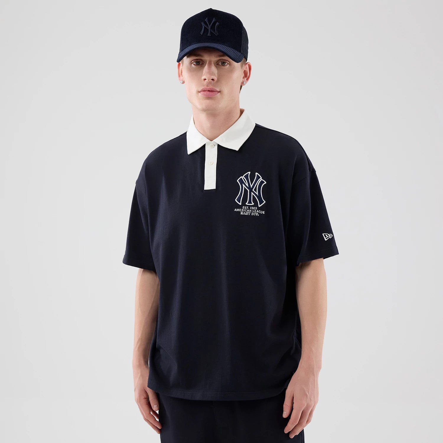 The model is wearing this MLB New York Yankees Polo T-Shirt in navy. 3