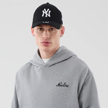 The model is wearing this New Era Open Hem Pullover Hoodie in grey. 6