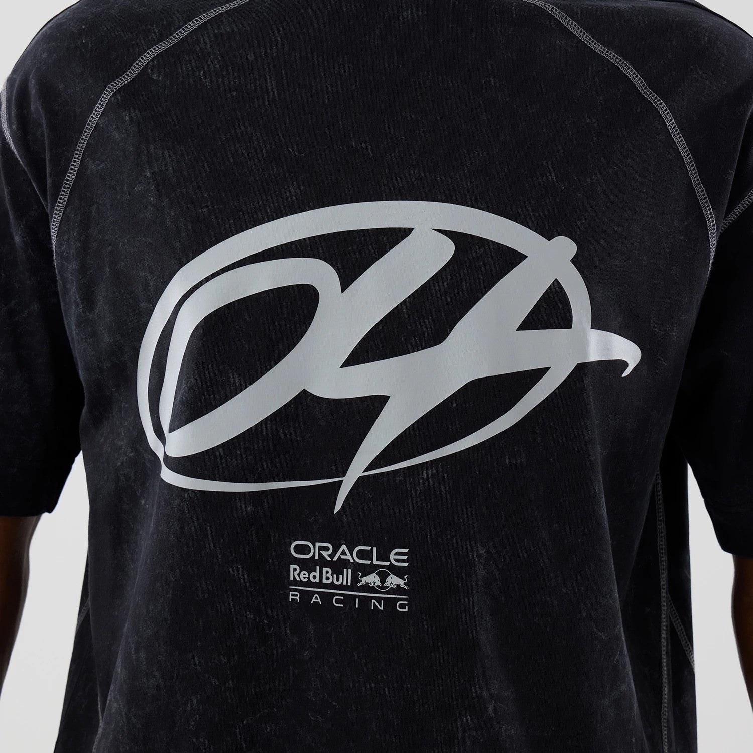 The model is wearing this Red Bull Racing Drop Shoulder T-Shirt in black. 4