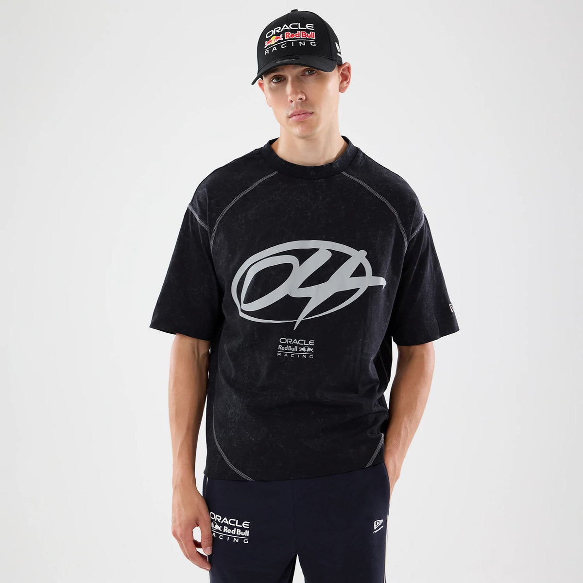 The model is wearing this Red Bull Racing Drop Shoulder T-Shirt in black. 1