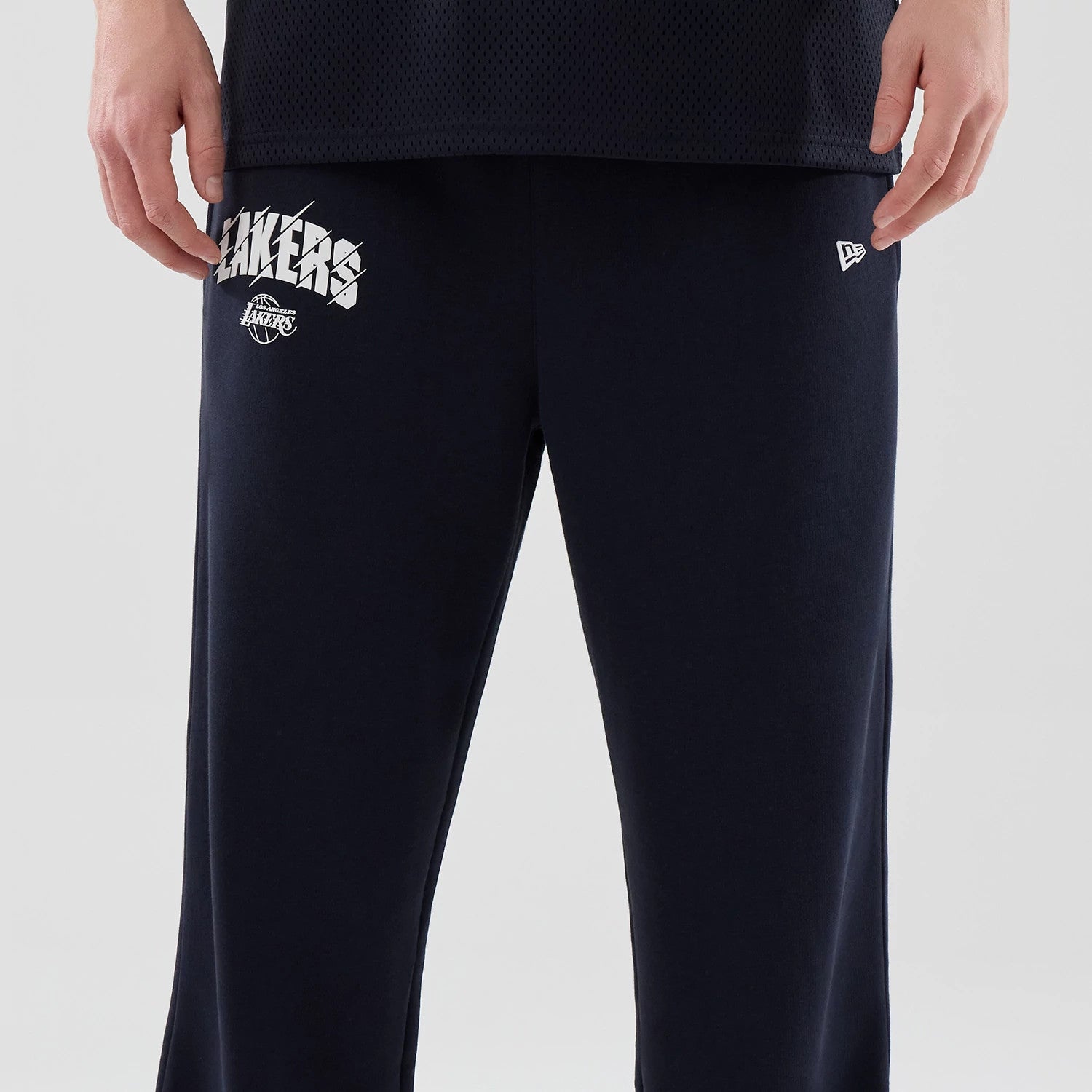 The model is wearing these NBA Core Plus LA Lakers Straight Leg Joggers in navy. 3