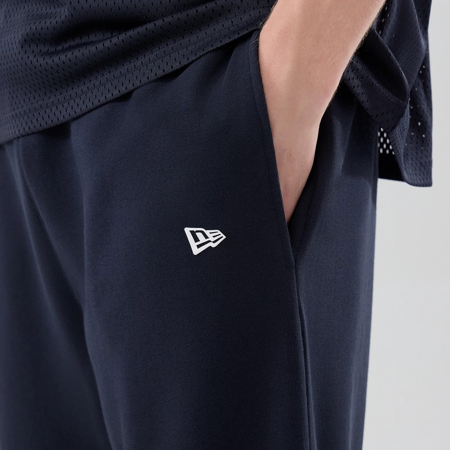 The model is wearing these NBA Core Plus LA Lakers Straight Leg Joggers in navy. 5