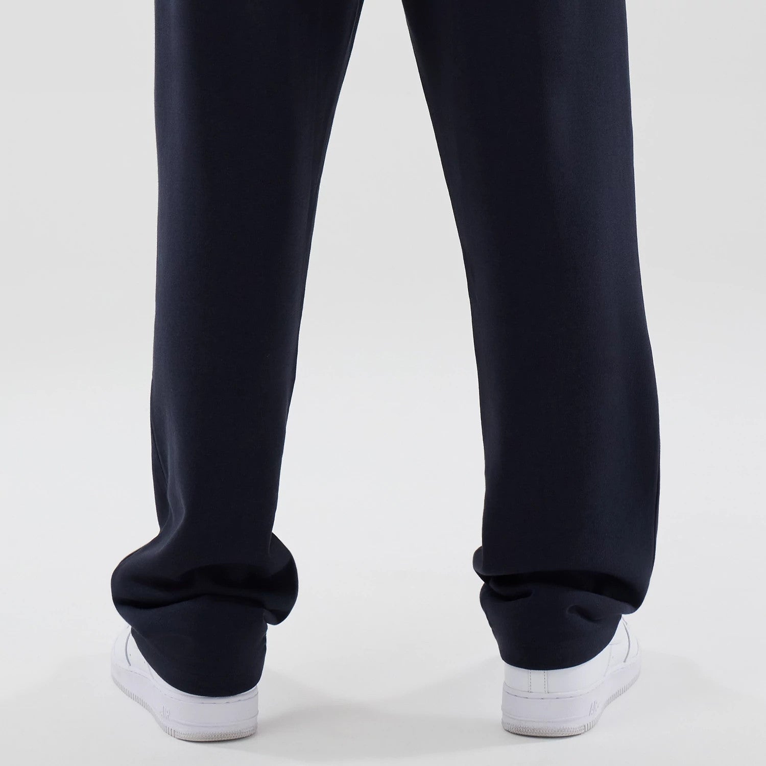 The model is wearing these NBA Core Plus LA Lakers Straight Leg Joggers in navy. 7