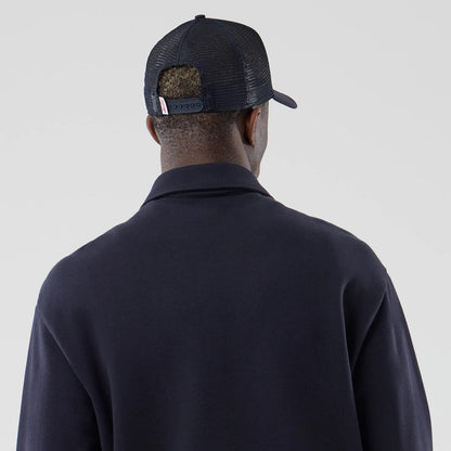 The model is wearing this MLB LA Dodgers Oversized 1/4 Zip Sweater in navy. 7