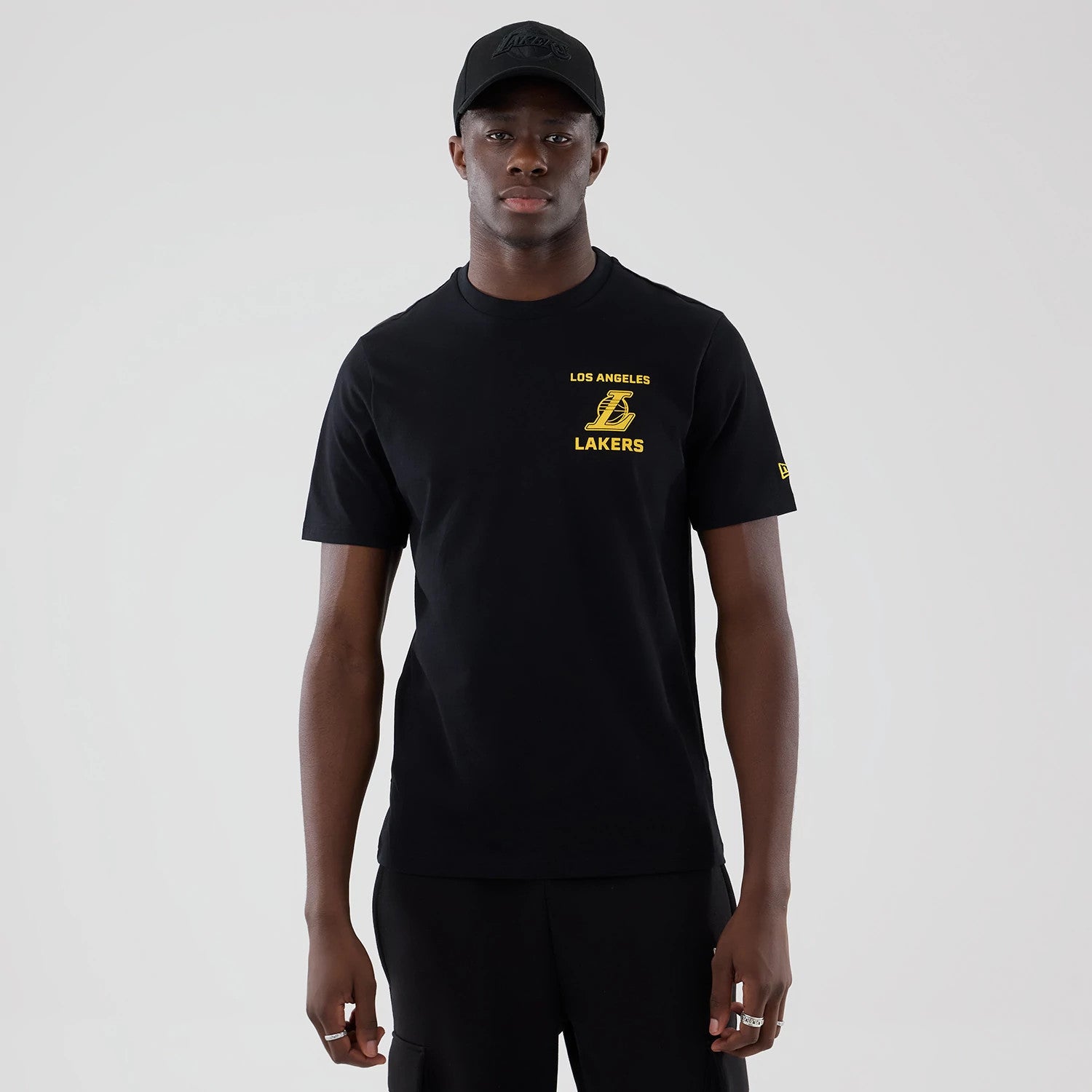 The model is wearing this NBA Court Graphic LA Lakers T-Shirt in black. 3