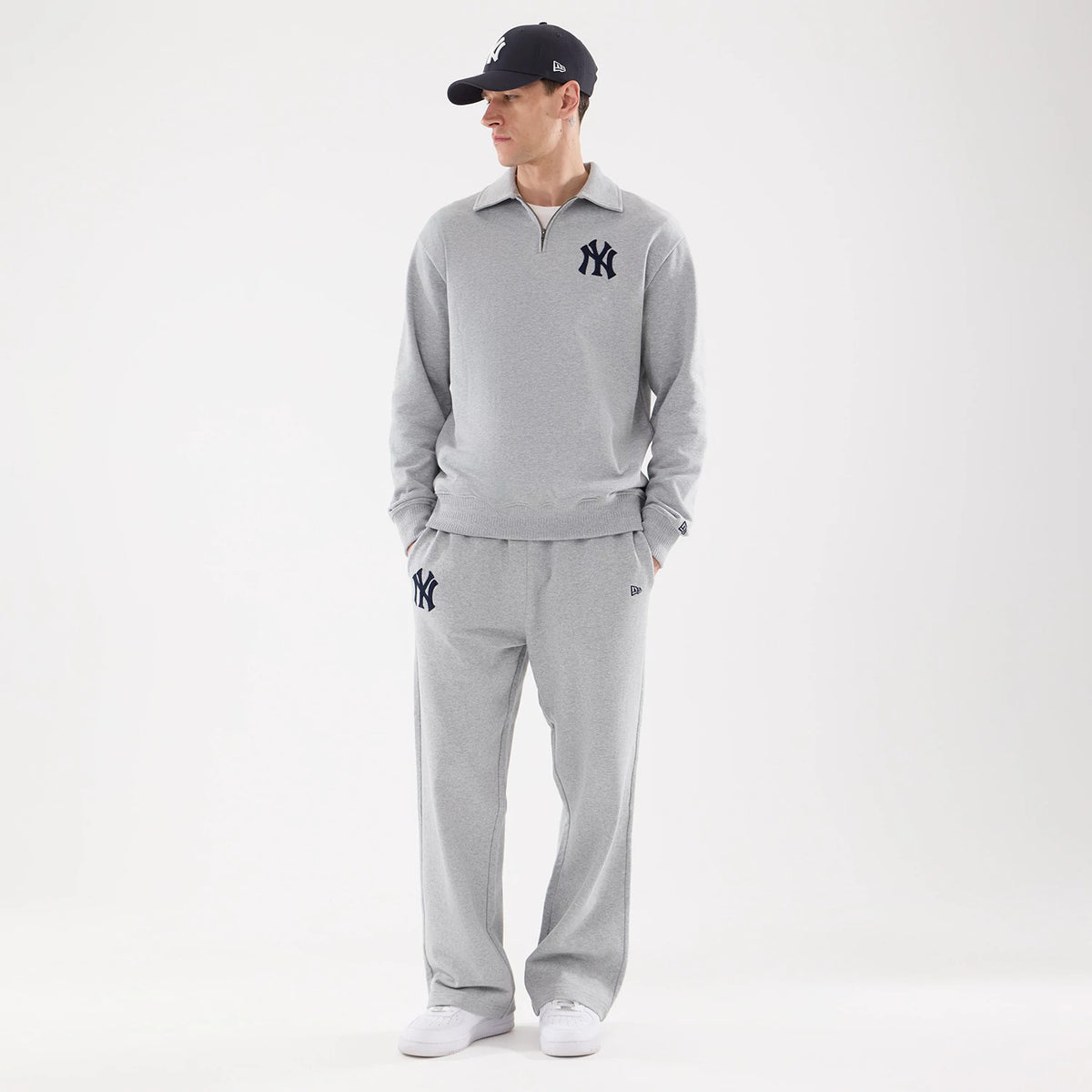 The model is wearing these MLB Straight Leg New York Yankees Straight Leg Joggers in grey. 8