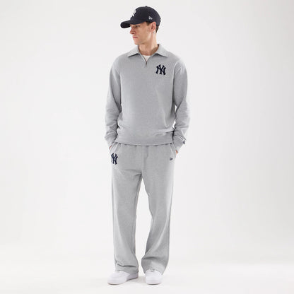 The model is wearing these MLB Straight Leg New York Yankees Straight Leg Joggers in grey. 8