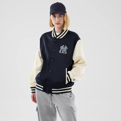 The model is wearing this MLB Jersey Bomber New York Yankees Jacket in navy. 4